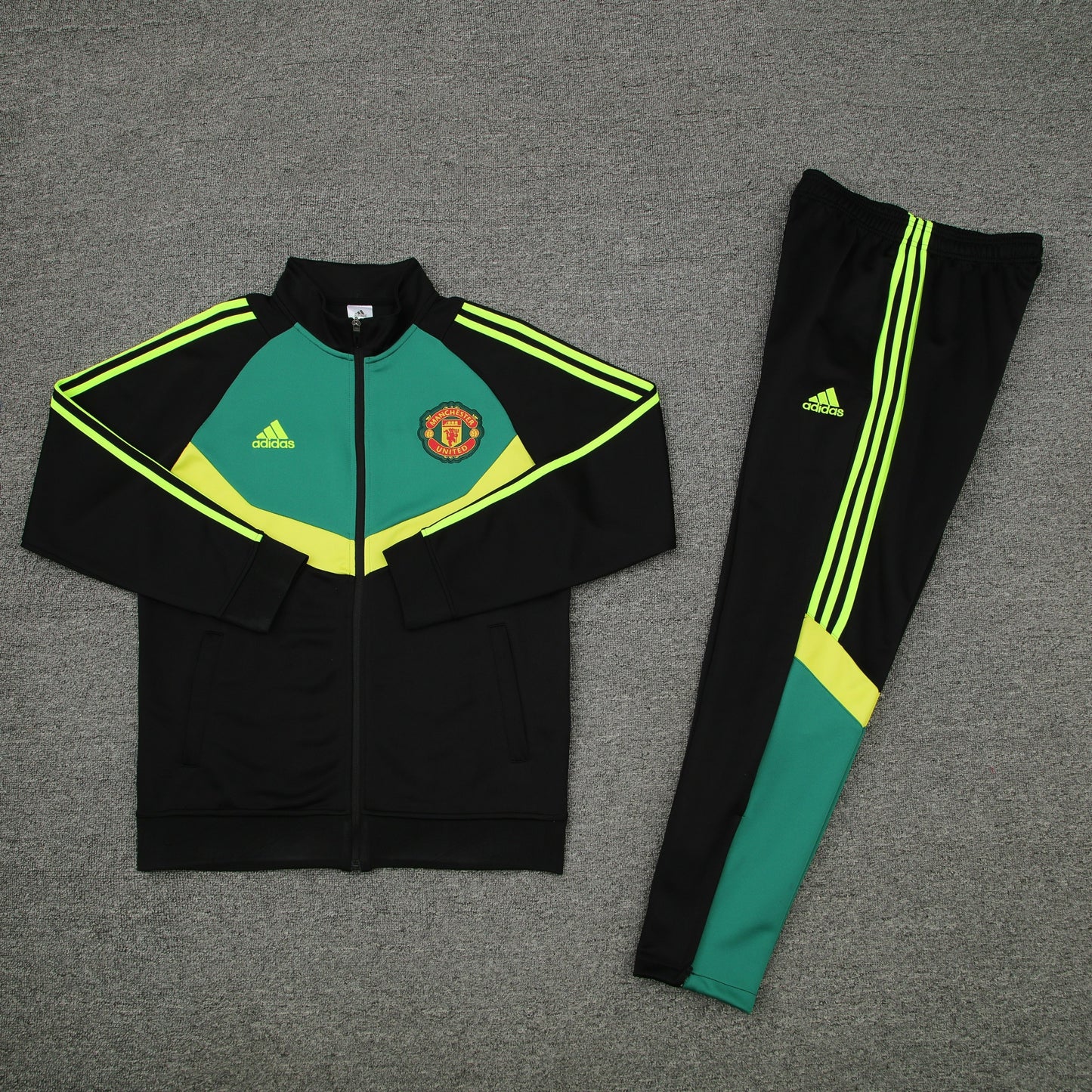 MANCHESTER UNITED TRACKSUIT 24/25 - UNISSEX/UNISSEX - GREEN E BLACK